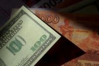 Российский рубль приостановил свое снижение