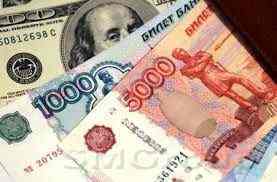 По итогам торгов на ММВБ рубль окреп на 78.40 копейки