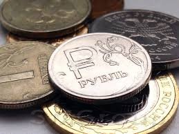 Нефть подтолкнула рубль к росту