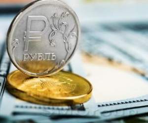 До выборов в России курс рубля будут сдерживать