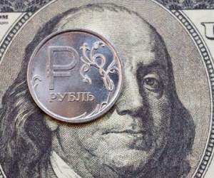 Курс доллара к рублю снизился до 64,50 рублей