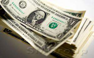 Доллар корректируется после пятничного роста