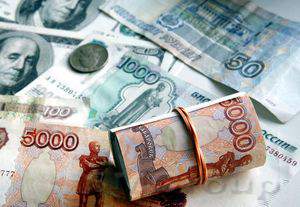 Курс рубля снижался в тандеме с нефтяными котировками