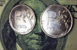 Ураганный рост цен на нефть укрепил рубль