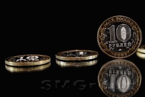 Рубль спокойно отреагировал на снижение ставки ЦБ и решение агентства Standard&Poor’s 
