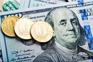 Рубль под давлением из-за пика долларовых выплат