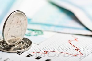 Денежные рынки: Спрос на ОФЗ поддерживает рубль