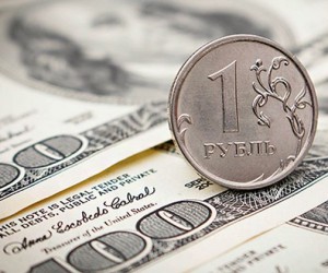 Нефть и налоговые выплаты удерживают рубль от снижения