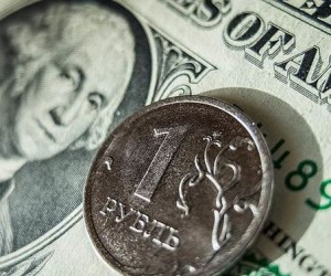Курс рубля опустится ниже отметки 63 за доллар Курс рубля опустится ниже отметки 63 за доллар