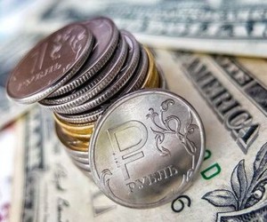 Рубль развернулся после отказа от закупки валюты для Минфина 