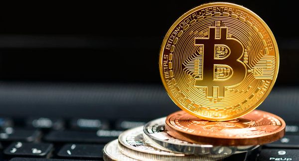 Курс биткоина вцепился за отметку $20000