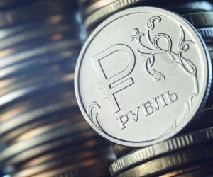Рубль дешевеет к доллару на 0.3% и укрепляется против евро на 0.2%
