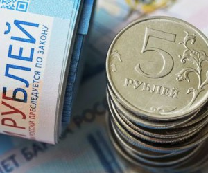 Рубль частично отыграл потери на росте нефтяных цен Рубль частично отыграл потери на росте нефтяных цен
