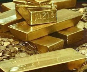 Золото за сутки потеряло 3$ усиливая падение из-за других рынков