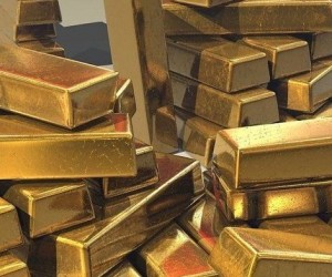 Курс золота продолжает борьбу с долларом