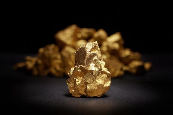 Золото возобновило рост на фоне улучшения рыночных настроений
