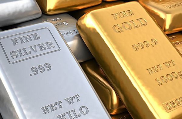 Курс золота растет вопреки сильному доллару и перспективам инфляции