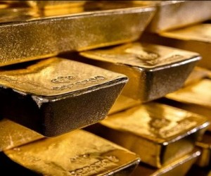 Без шансов на рост: Цена тройской унции золота под давлением доллара