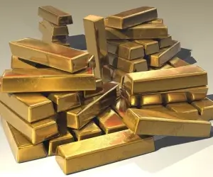 Золото выросло на 1% на фоне снижения доходности