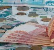 Налоги и нефть поддерживают рубль против доллара